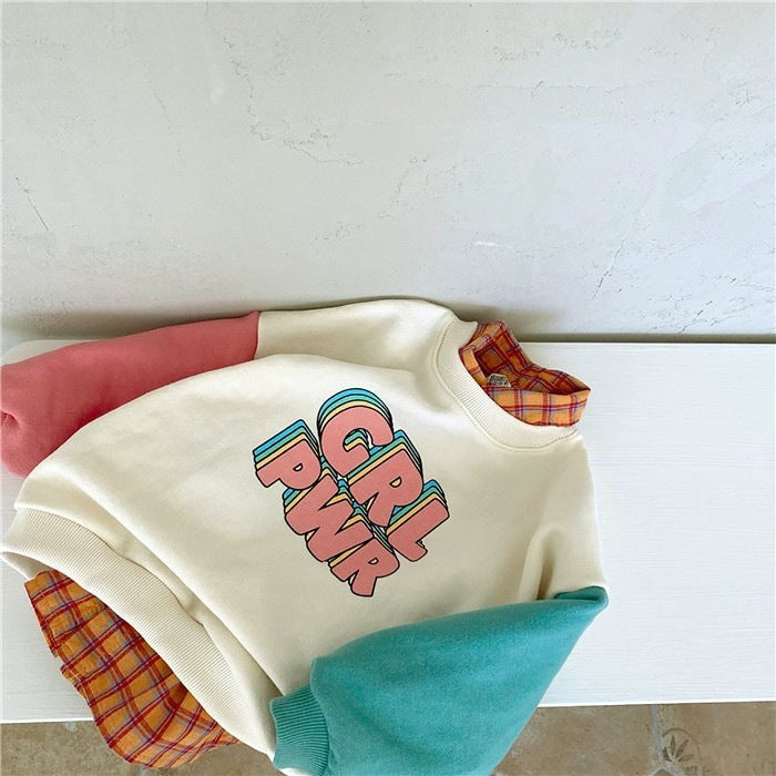 A fashionable baby and toddler style with color-blocking sleeves, letter-shaped sweatshirts and color-blocking pants with large pockets