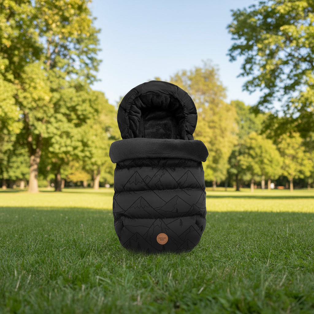 sleeping baby in the park sleeping bag autumn 